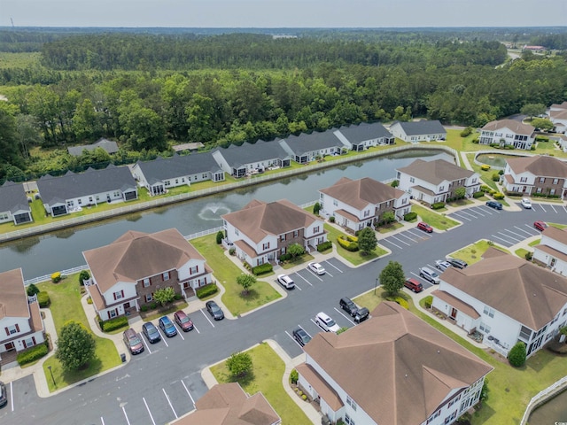 8855 Radcliff Dr NW Unit 53D, Calabash, NC 28467 - aerial view of residential area featuring a forest and a large body of water
