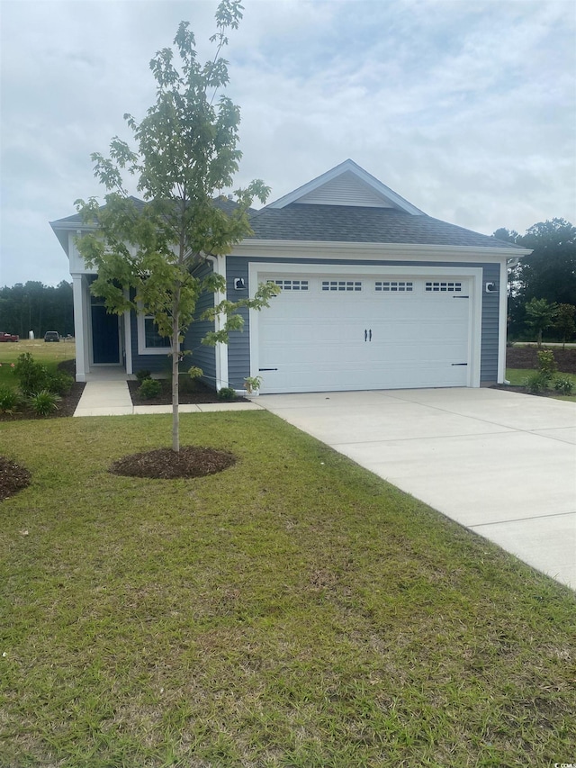 1261 Saxon Ct, Myrtle Beach, SC 29579 - ranch-style house featuring driveway, a front lawn, and an attached garage