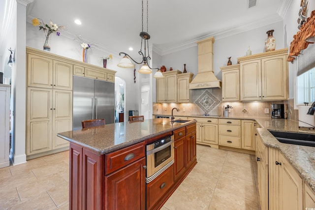 784 Caines Landing Rd, Conway, SC 29526 - kitchen with stainless steel built in fridge, a sink, custom exhaust hood, tasteful backsplash, and ornamental molding