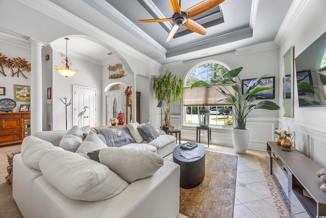 784 Caines Landing Rd, Conway, SC 29526 - living area with decorative columns, arched walkways, ceiling fan, light tile patterned flooring, and a raised ceiling