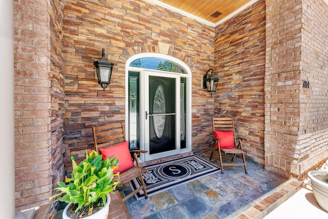 784 Caines Landing Rd, Conway, SC 29526 - view of exterior entry with brick siding and a porch