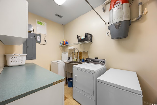 784 Caines Landing Rd, Conway, SC 29526 - laundry room with washer and clothes dryer, electric panel, cabinet space, and light tile patterned flooring