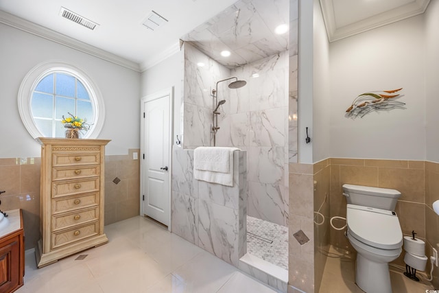 784 Caines Landing Rd, Conway, SC 29526 - full bathroom with tile walls, ornamental molding, a marble finish shower, toilet, and wainscoting