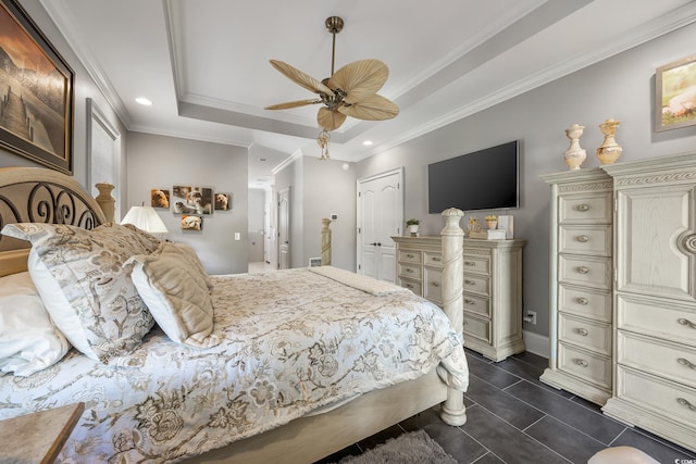 784 Caines Landing Rd, Conway, SC 29526 - bedroom featuring a tray ceiling, ornamental molding, a closet, a ceiling fan, and recessed lighting