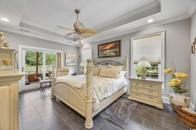 784 Caines Landing Rd, Conway, SC 29526 - bedroom featuring crown molding, a tray ceiling, access to outside, recessed lighting, and dark tile patterned flooring