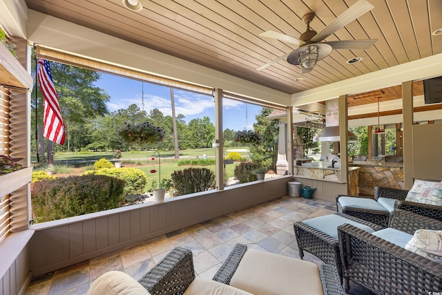 784 Caines Landing Rd, Conway, SC 29526 - sunroom / solarium with ceiling fan, an outdoor kitchen, and an outdoor hangout area