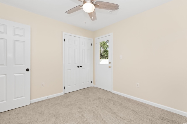 814 Night Heron Ln, Myrtle Beach, SC 29572 - unfurnished bedroom with carpet, baseboards, a closet, and a ceiling fan