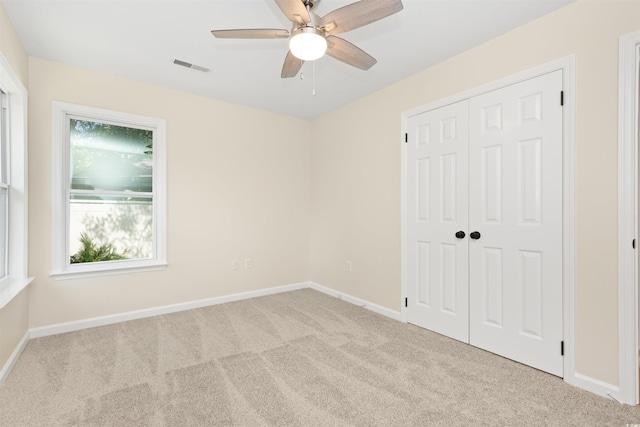814 Night Heron Ln, Myrtle Beach, SC 29572 - unfurnished bedroom with carpet, baseboards, and a closet