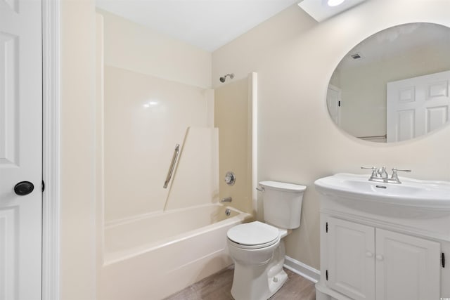 814 Night Heron Ln, Myrtle Beach, SC 29572 - bathroom with vanity, washtub / shower combination, toilet, and wood finished floors