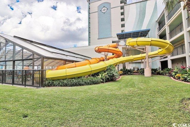 2301 S Ocean Blvd Unit 1418, Myrtle Beach, SC 29577 - view of green lawn featuring glass enclosure