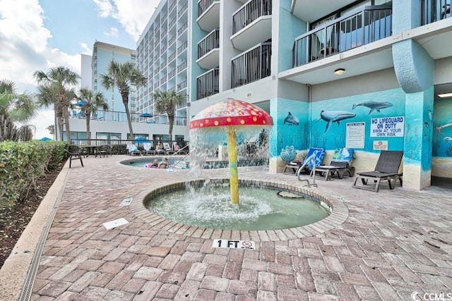 2301 S Ocean Blvd Unit 1418, Myrtle Beach, SC 29577 - view of home's community with a patio