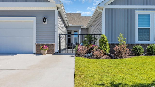 4053 Taranto Loop Unit C, Myrtle Beach, SC 29579 - property entrance with board and batten siding, an attached garage, concrete driveway, a gate, and brick siding