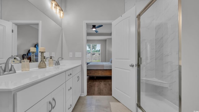 4053 Taranto Loop Unit C, Myrtle Beach, SC 29579 - ensuite bathroom featuring a marble finish shower, double vanity, and marble look tile flooring