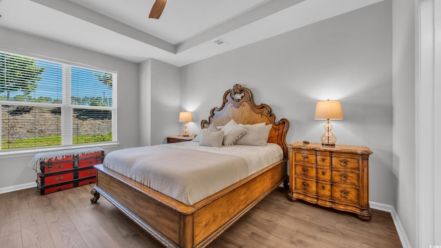 4053 Taranto Loop Unit C, Myrtle Beach, SC 29579 - bedroom featuring wood finished floors and ceiling fan