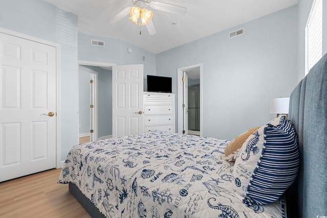 3401 N Ocean Blvd Unit 110, North Myrtle Beach, SC 29582 - bedroom featuring vaulted ceiling, wood finished floors, and a ceiling fan
