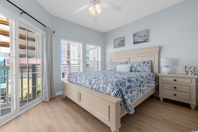 3401 N Ocean Blvd Unit 110, North Myrtle Beach, SC 29582 - bedroom with light wood finished floors, access to outside, a ceiling fan, and baseboards