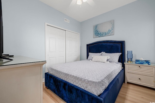 3401 N Ocean Blvd Unit 110, North Myrtle Beach, SC 29582 - bedroom featuring light wood-type flooring, a closet, and a ceiling fan