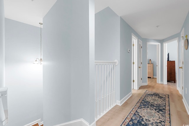 3401 N Ocean Blvd Unit 110, North Myrtle Beach, SC 29582 - hallway featuring light wood-type flooring and baseboards
