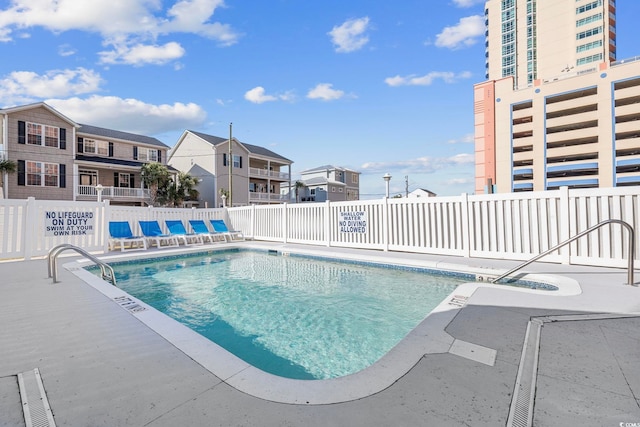 3401 N Ocean Blvd Unit 110, North Myrtle Beach, SC 29582 - community pool featuring a residential view and a patio