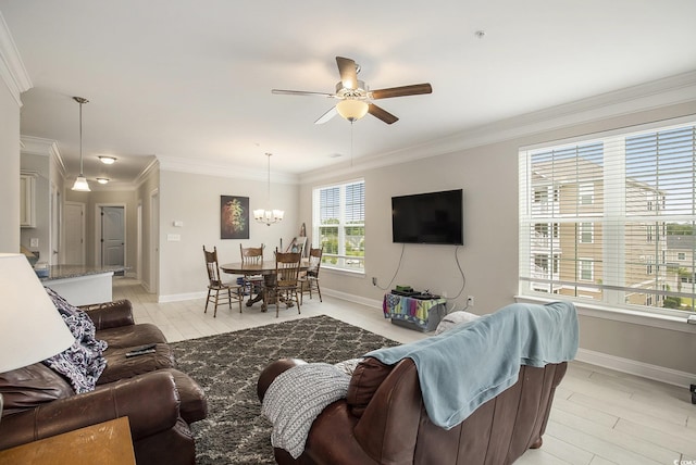 150 Ella Kinley Cir Unit 301, Myrtle Beach, SC 29588 - living room with ornamental molding, baseboards, a chandelier, ceiling fan, and light wood finished floors