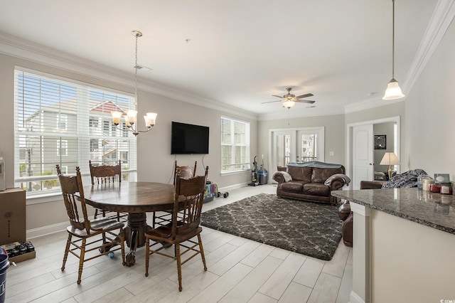 150 Ella Kinley Cir Unit 301, Myrtle Beach, SC 29588 - dining space featuring a chandelier, ornamental molding, baseboards, light wood-style floors, and a ceiling fan