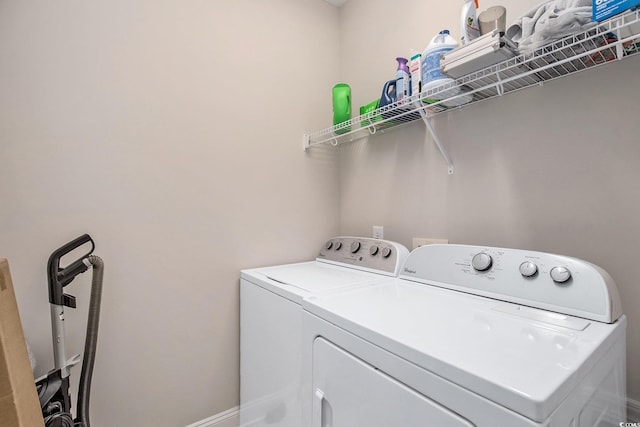 150 Ella Kinley Cir Unit 301, Myrtle Beach, SC 29588 - washroom featuring separate washer and dryer and baseboards