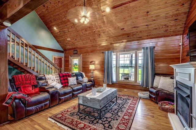 181 Halfway Rd, Nichols, SC 29581 - living room with hardwood / wood-style floors, wood ceiling, stairway, wood walls, and high vaulted ceiling