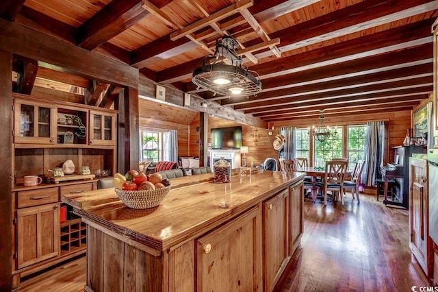 181 Halfway Rd, Nichols, SC 29581 - kitchen featuring wooden walls, wood finished floors, butcher block counters, wooden ceiling with exposed beams, and a kitchen island