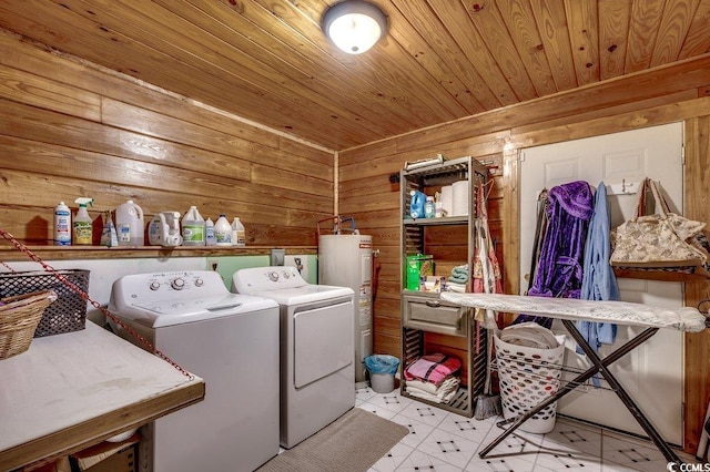 181 Halfway Rd, Nichols, SC 29581 - washroom featuring electric water heater, separate washer and dryer, wood ceiling, and wood walls
