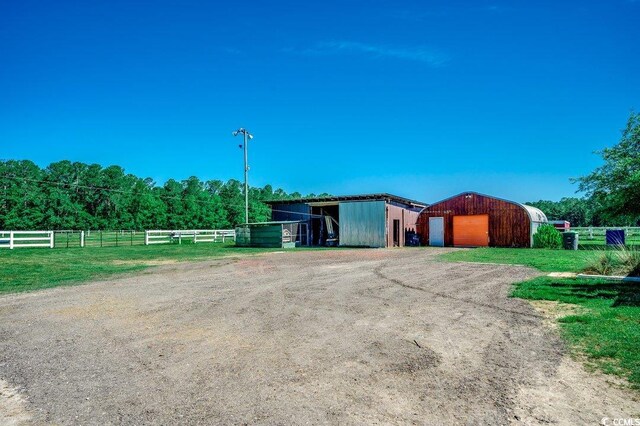 181 Halfway Rd, Nichols, SC 29581 - view of pole building featuring driveway