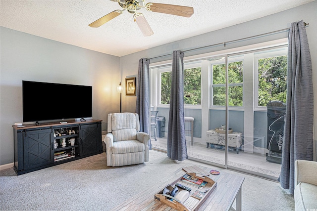 1460 Blue Tree Ct Unit E, Myrtle Beach, SC 29588 - living area with carpet flooring, a textured ceiling, and ceiling fan