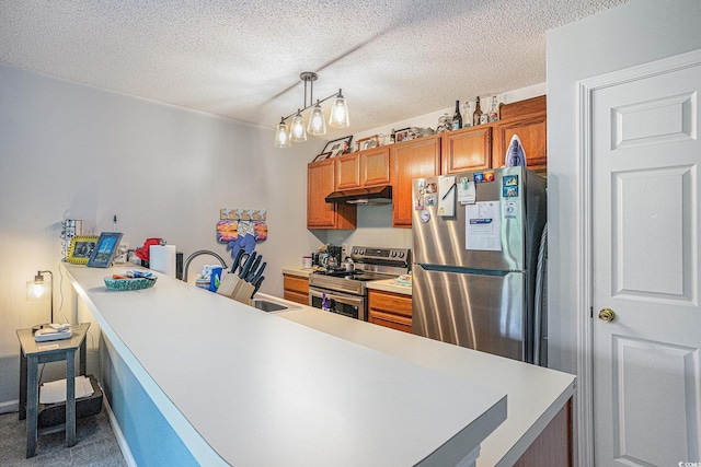 1460 Blue Tree Ct Unit E, Myrtle Beach, SC 29588 - kitchen featuring appliances with stainless steel finishes, under cabinet range hood, carpet floors, brown cabinetry, and light countertops