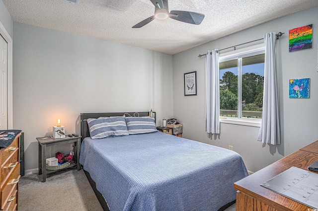 1460 Blue Tree Ct Unit E, Myrtle Beach, SC 29588 - carpeted bedroom with a textured ceiling and a ceiling fan