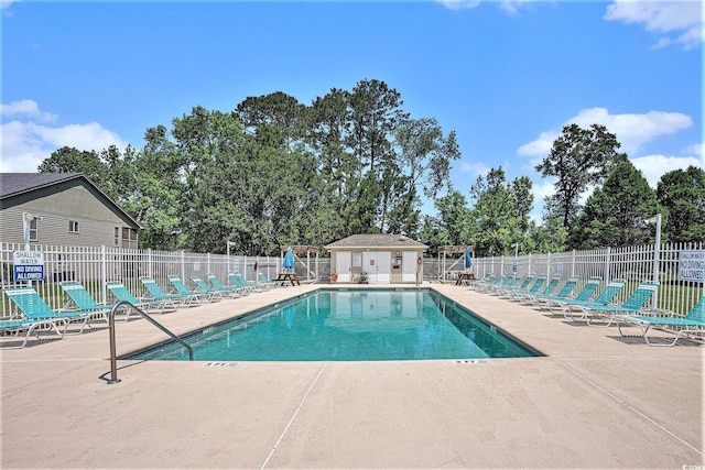 1460 Blue Tree Ct Unit E, Myrtle Beach, SC 29588 - community pool with a patio area and view of wooded area