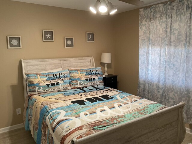 1900 Duffy St Unit L-5, North Myrtle Beach, SC 29582 - bedroom with baseboards and wood finished floors