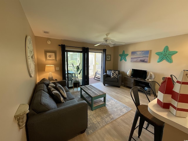 1900 Duffy St Unit L-5, North Myrtle Beach, SC 29582 - living room with light wood-style flooring and a ceiling fan