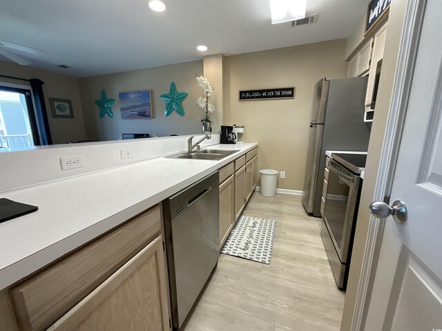 1900 Duffy St Unit L-5, North Myrtle Beach, SC 29582 - kitchen featuring stainless steel appliances, a sink, a ceiling fan, light countertops, and recessed lighting