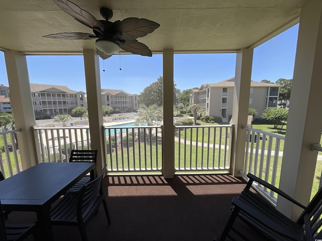 1900 Duffy St Unit L-5, North Myrtle Beach, SC 29582 - balcony featuring a ceiling fan and a residential view