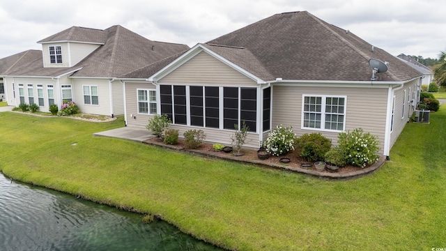 1224 Checkerberry St, Longs, SC 29568 - back of property featuring a sunroom, a yard, and roof with shingles