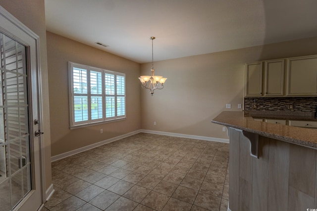 1224 Checkerberry St, Longs, SC 29568 - unfurnished dining area featuring light tile patterned floors, a chandelier, and baseboards