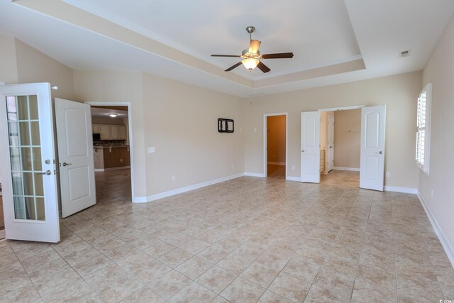 1224 Checkerberry St, Longs, SC 29568 - unfurnished room with a ceiling fan, light tile patterned floors, a raised ceiling, baseboards, and ornamental molding
