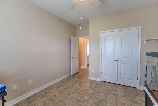 1224 Checkerberry St, Longs, SC 29568 - unfurnished bedroom with a closet, a ceiling fan, baseboards, and light tile patterned floors