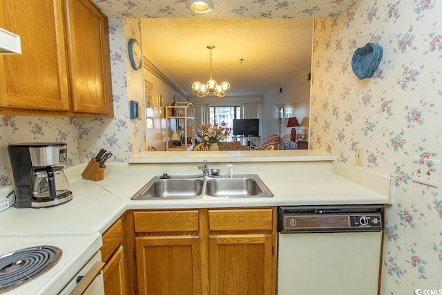 305 N Hillside Dr Unit 206, North Myrtle Beach, SC 29582 - kitchen featuring white dishwasher, wallpapered walls, light countertops, brown cabinets, and a chandelier