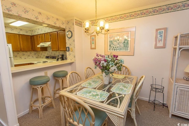 305 N Hillside Dr Unit 206, North Myrtle Beach, SC 29582 - dining room with ornamental molding, carpet flooring, and a chandelier