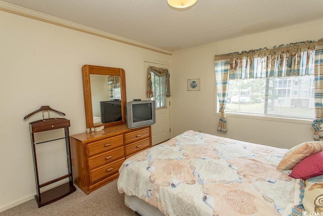 305 N Hillside Dr Unit 206, North Myrtle Beach, SC 29582 - bedroom featuring multiple windows, crown molding, light colored carpet, and a textured ceiling