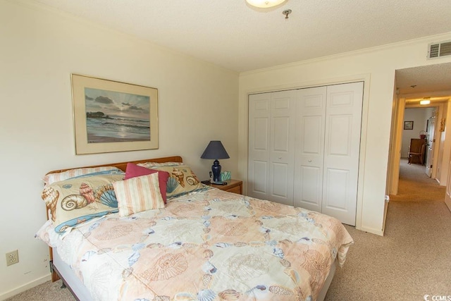 305 N Hillside Dr Unit 206, North Myrtle Beach, SC 29582 - carpeted bedroom with a closet and ornamental molding