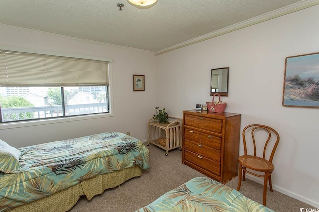 305 N Hillside Dr Unit 206, North Myrtle Beach, SC 29582 - carpeted bedroom with ornamental molding, multiple windows, and a textured ceiling