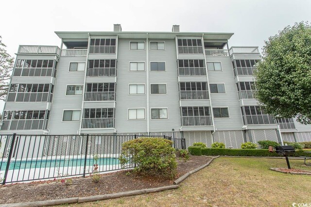 305 N Hillside Dr Unit 206, North Myrtle Beach, SC 29582 - view of property with a community pool