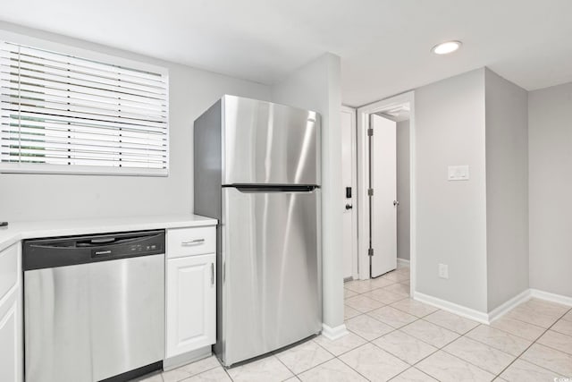 6703 Jefferson Pl Unit B7, Myrtle Beach, SC 29572 - kitchen with appliances with stainless steel finishes, light countertops, light tile patterned floors, white cabinets, and recessed lighting