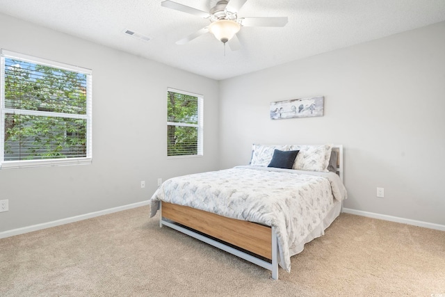 6703 Jefferson Pl Unit B7, Myrtle Beach, SC 29572 - bedroom with light colored carpet and a ceiling fan
